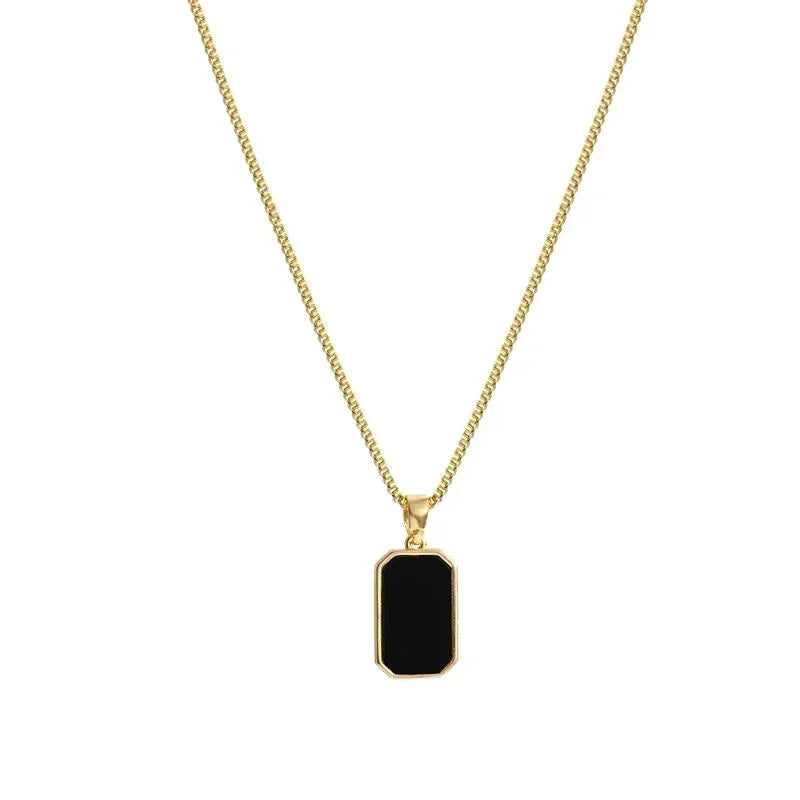 NOIR VÉRITÉ Geometric Gold Pendant